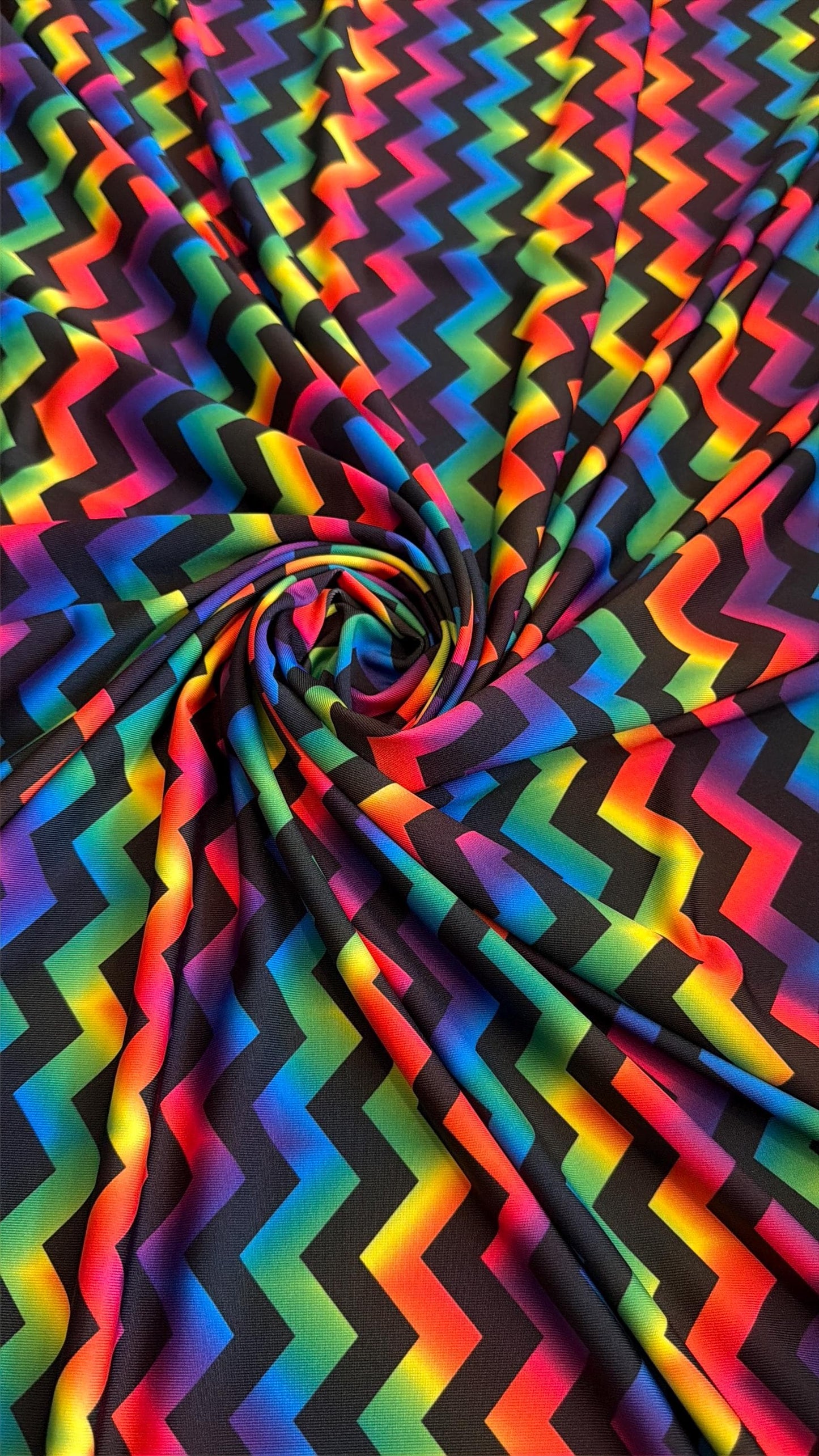 New tie dye zigzag design print on the best quality nylon spandex4-way stretch 58/60”sold by the YD. ships Worldwide from Los Angeles
