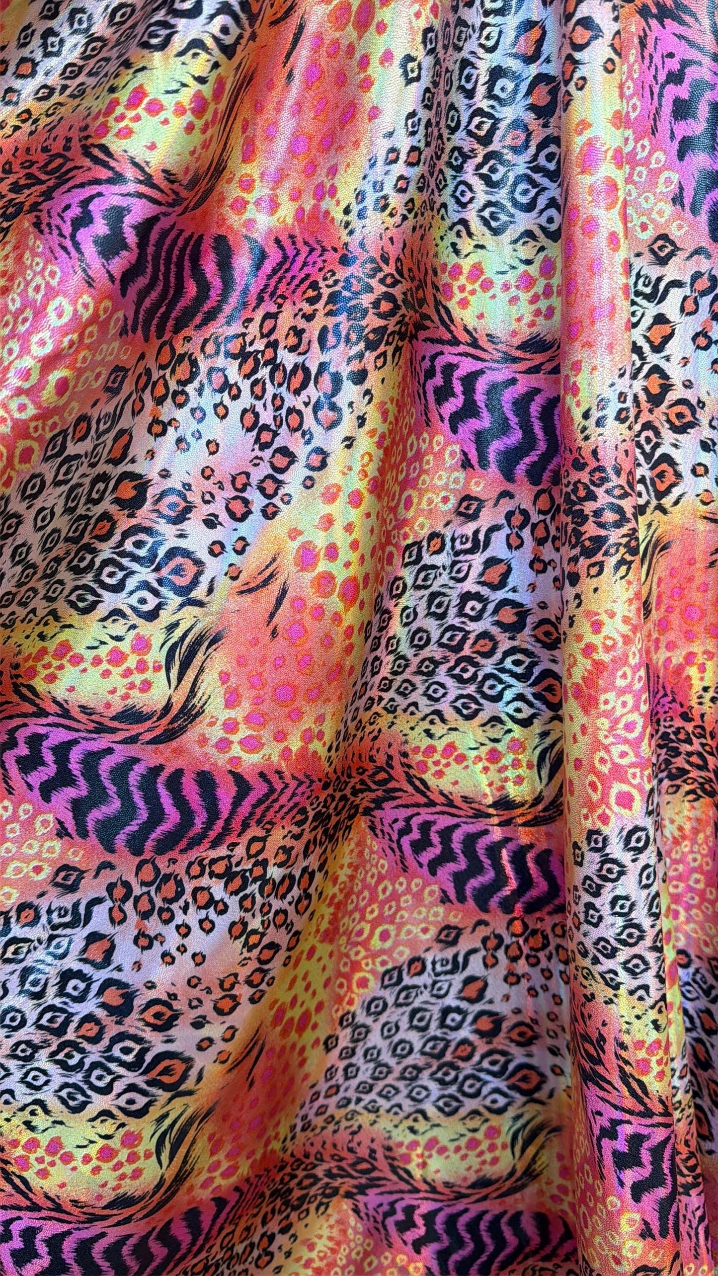 New abstract animal design  lacer hologram metallic nylon spandex 4-way stretch 58/60”sold by the YD.Ships worldwide from Los Angeles Ca.