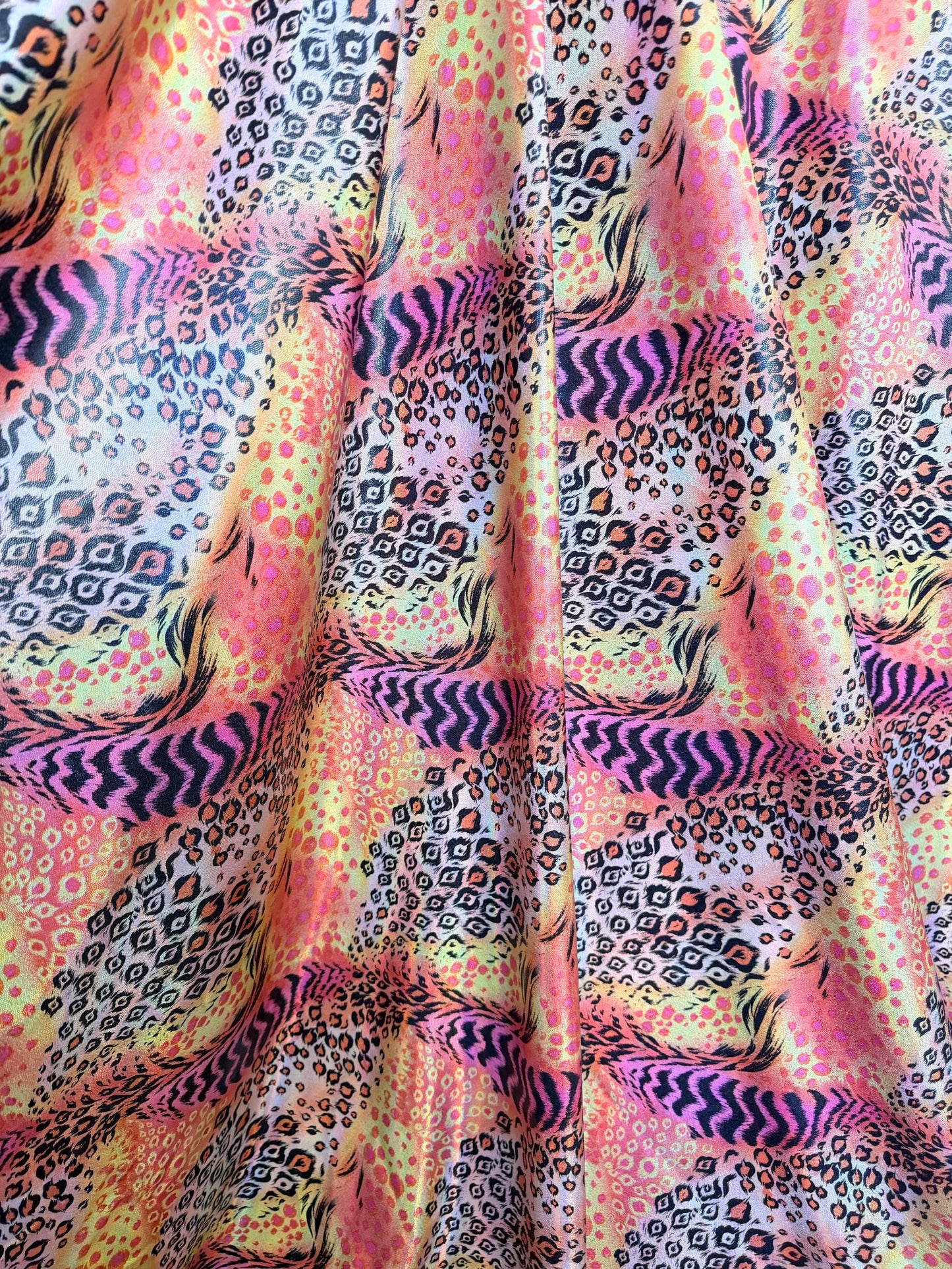 New abstract animal design  lacer hologram metallic nylon spandex 4-way stretch 58/60”sold by the YD.Ships worldwide from Los Angeles Ca.