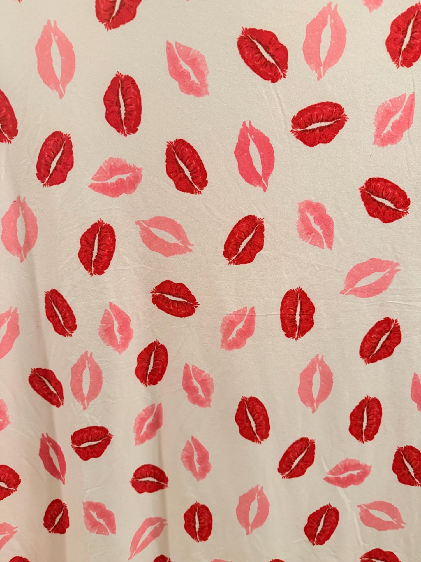 Bella red lipstick design print on poly spandex 4-way stretch medium weight 58/60 sold by the YD. ships worldwide from Los Angeles CA