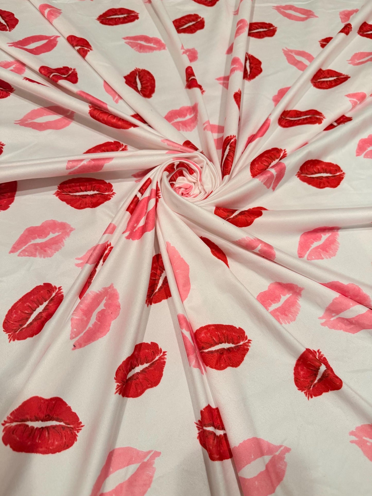 Bella red lipstick design print on poly spandex 4-way stretch medium weight 58/60 sold by the YD. ships worldwide from Los Angeles CA